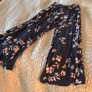 Billabong faux-wrap pants in crinkled navy with pink and cream floral print